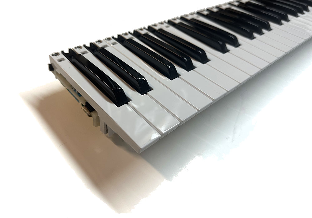 Keybed assembly, 61-note