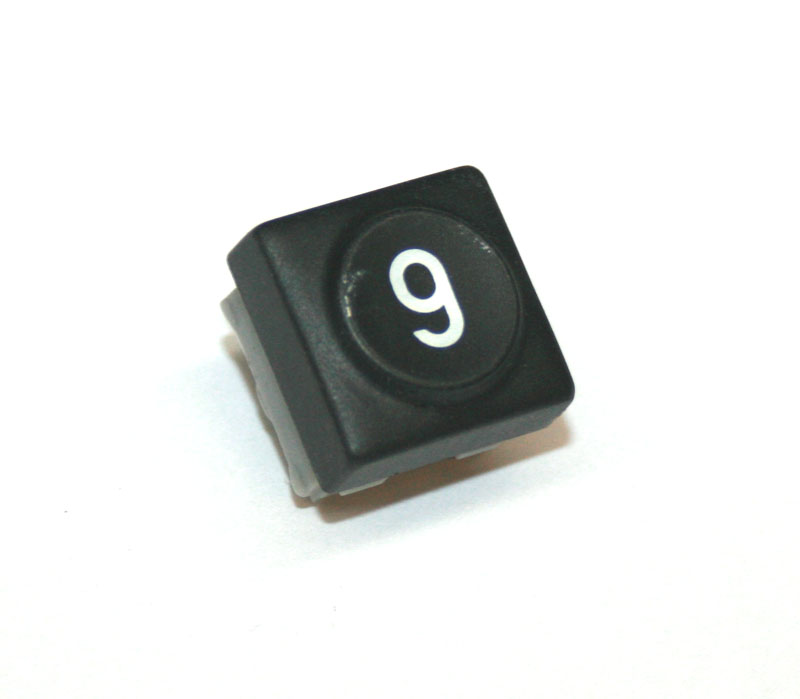 Panel switch, black, with numeral '9'