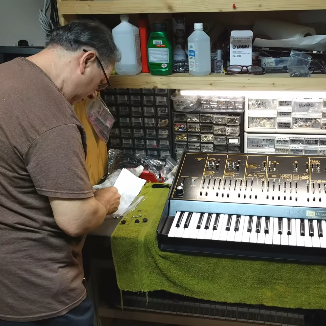 Gerald with an ARP Odyssey on the workbench.